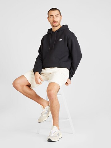 new balanceSweater majica 'Sport Essentials' - crna boja