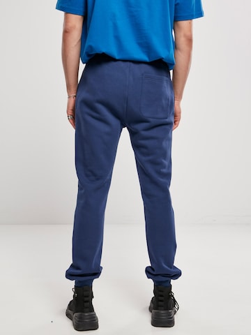 Urban Classics Zwężany krój Spodnie 'Basic' w kolorze niebieski