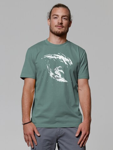 Watapparel Shirt ' Surfing Spaceman ' in Groen: voorkant