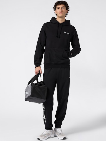 Champion Authentic Athletic Apparel Дънки Tapered Leg Панталон в черно