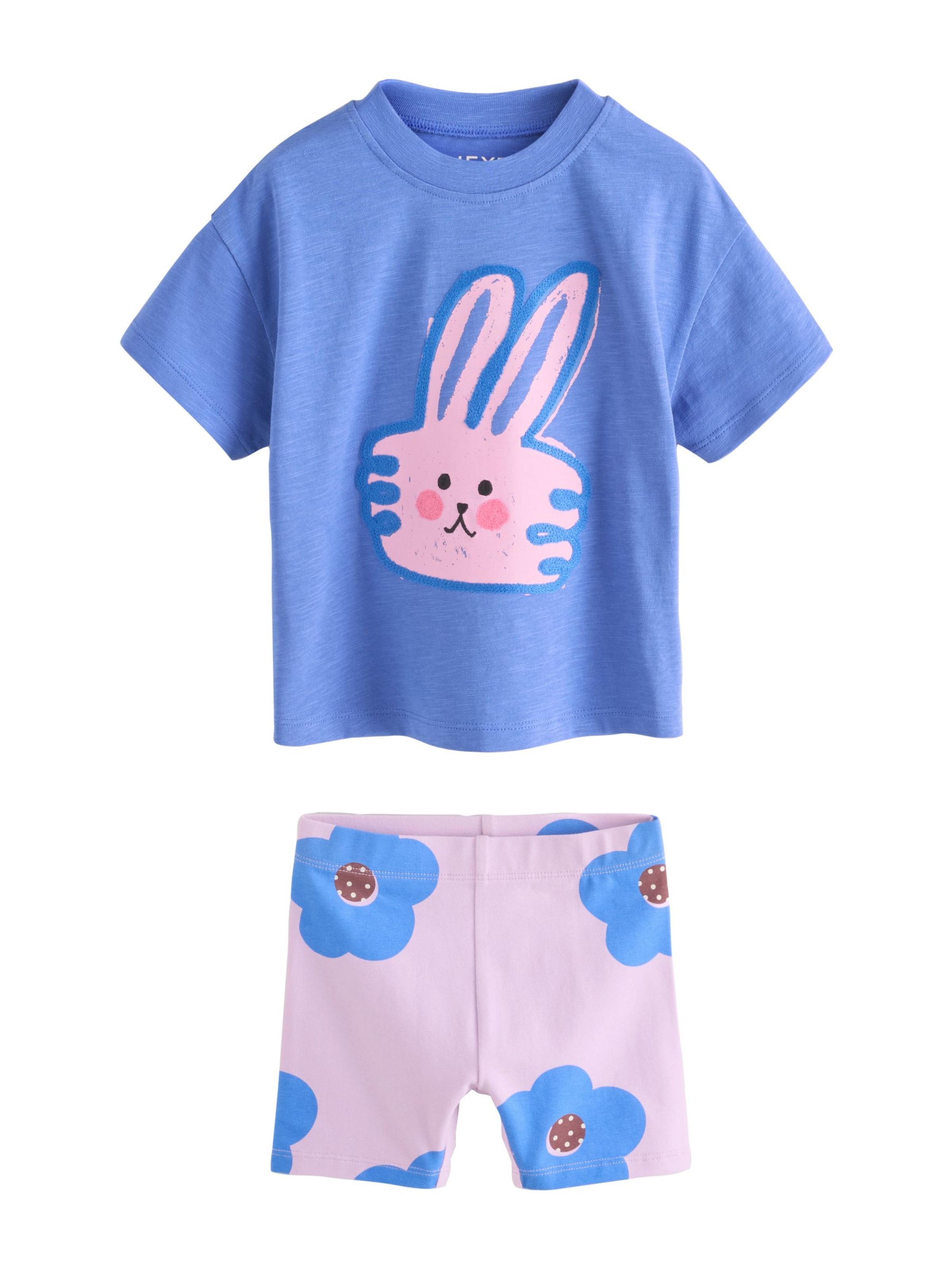 Next Set i blå: framsida