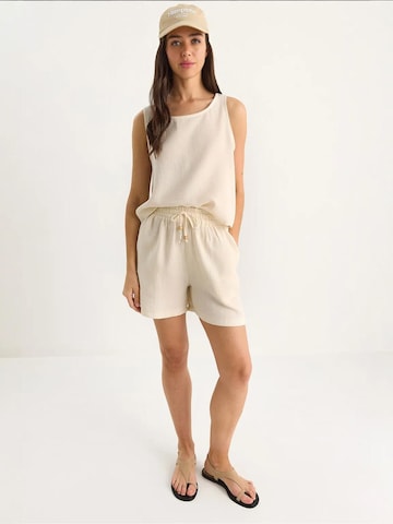 Pantalons de tailleur Bianco Lucci en beige
