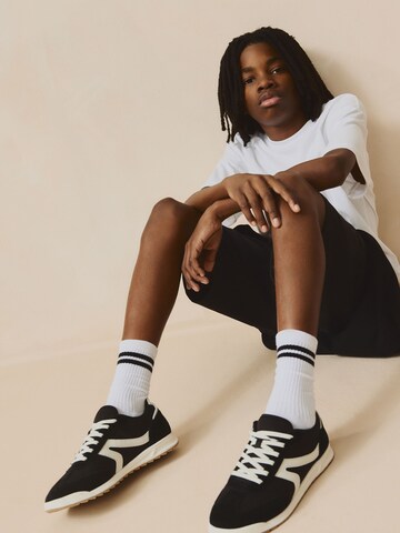 Baskets Next en noir
