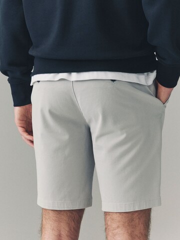 Slimfit Pantaloni chino di Next in beige
