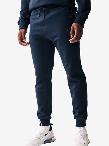 Next Tapered Weatherproof pants in Blue: front