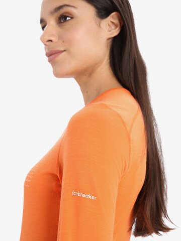 ICEBREAKER - Camiseta funcional 'Oasis' en naranja