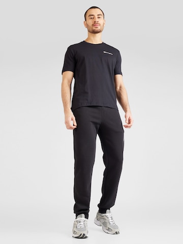 Champion Authentic Athletic ApparelTapered Hlače - crna boja