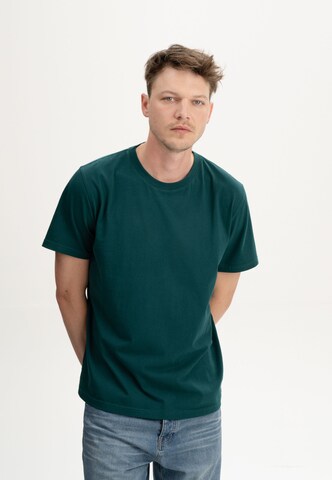 MELA T-shirt 'Sadhil' i grön: framsida