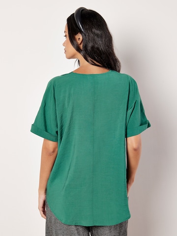 Chemisier Apricot en vert