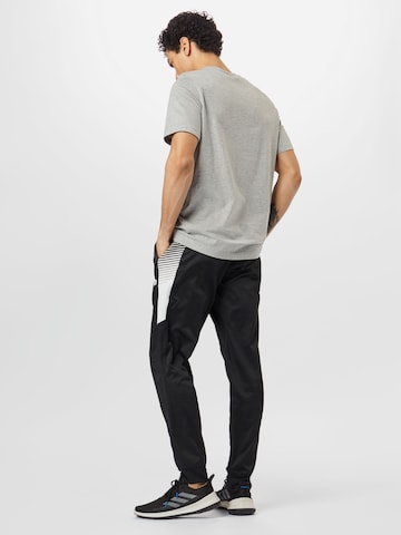 ADIDAS PERFORMANCE - Tapered Pantalón deportivo en negro