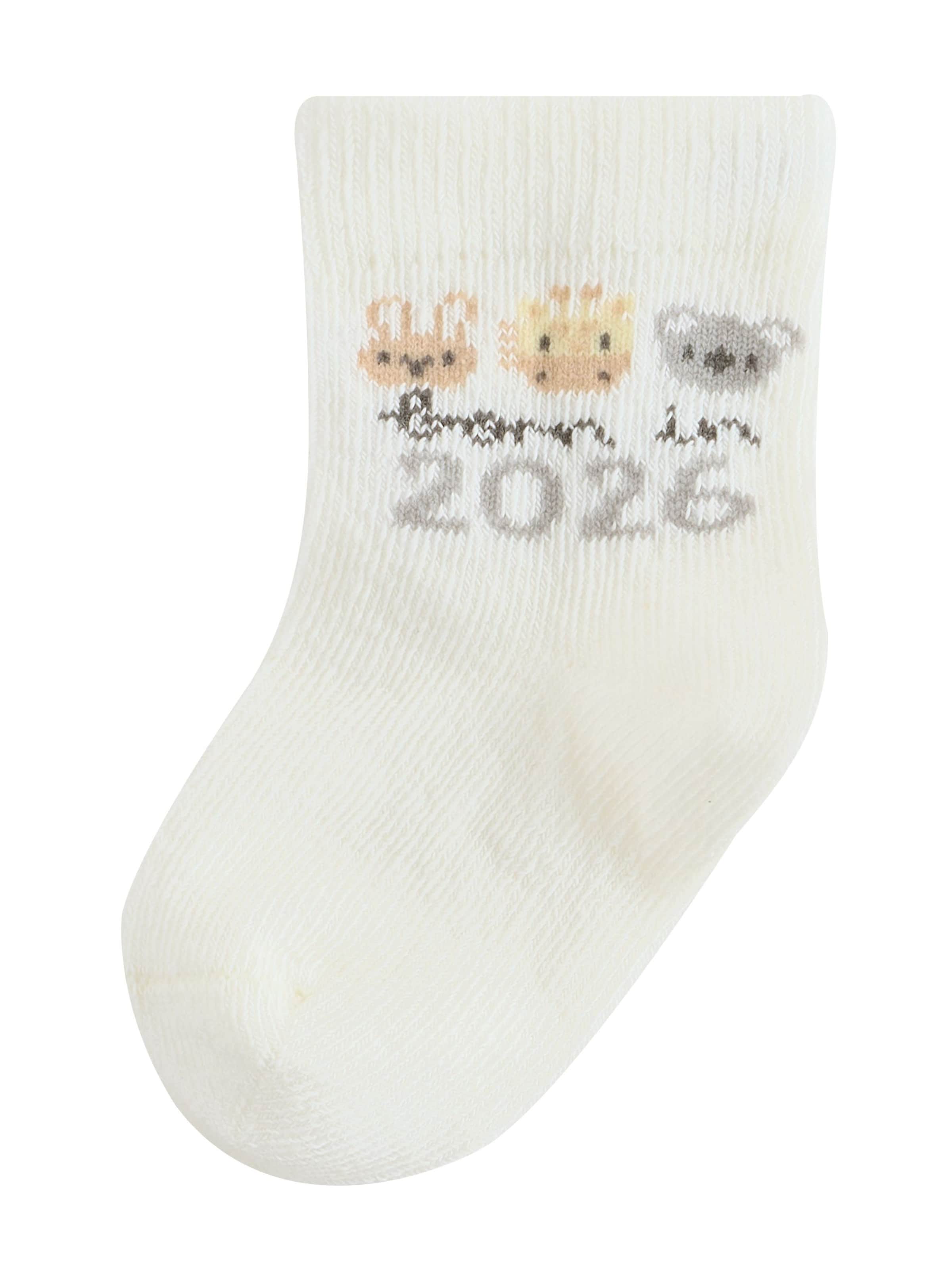 Next Sockor 'Born In 2026' i vit: framsida
