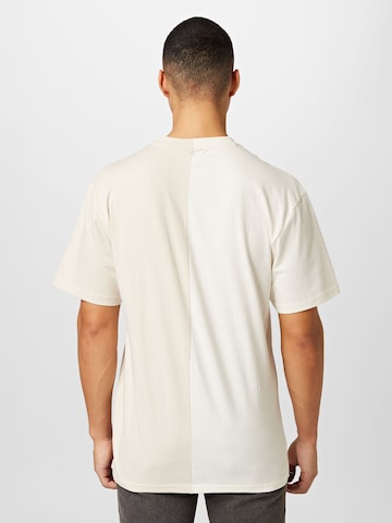 Karl Kani T-Shirt in Beige