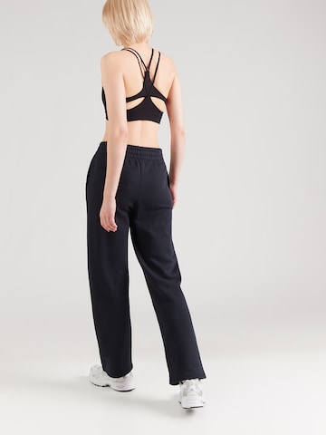 Regular Pantaloni sport 'Rival' de la UNDER ARMOUR pe negru