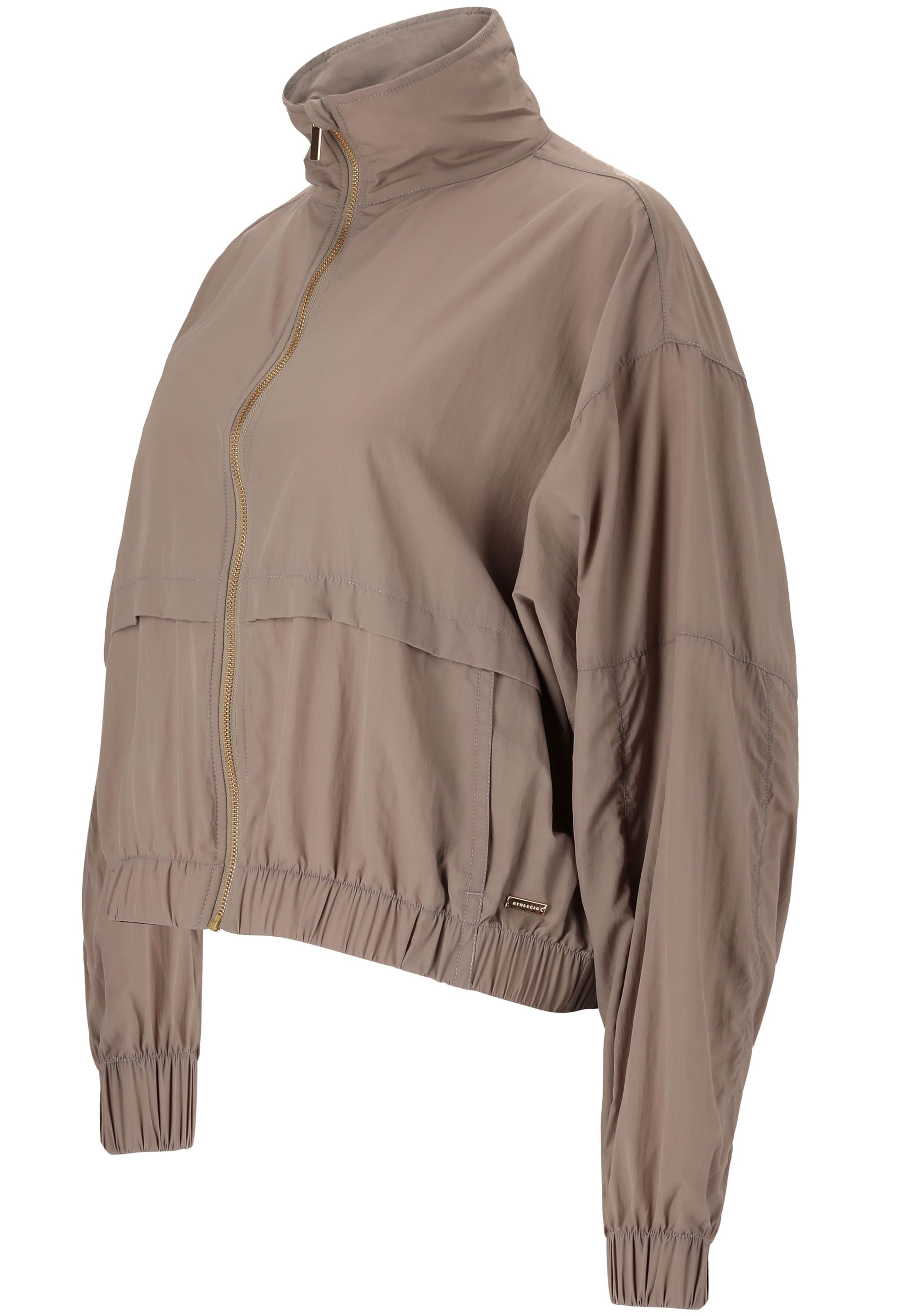 Veste de sport 'THARBIA' Athlecia en beige