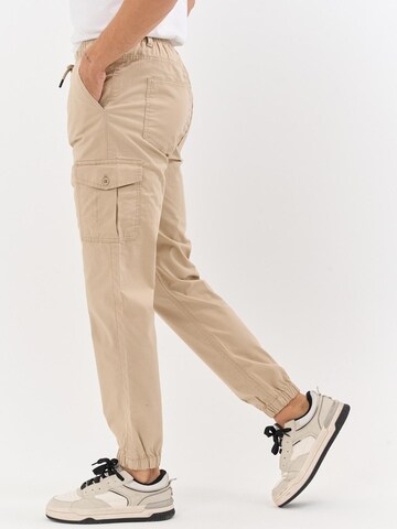 comeor Regular Cargo Pants in Beige