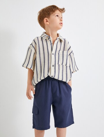 Koton Loose fit Trousers in Blue: front