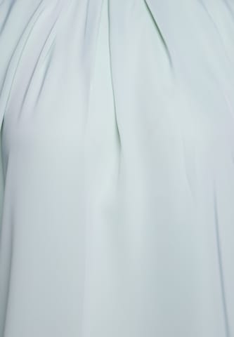 faina - Blusa 'GLOW' en verde