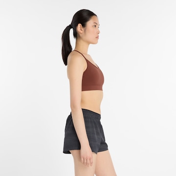 new balance Bralette Sports bra 'Essential' in Brown