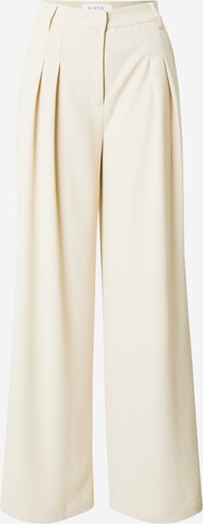 Loosefit Pantaloni con pieghe 'Mathilda' di ABOUT YOU x Iconic by Tatiana Kucharova in beige: frontale