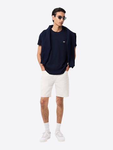 Maglietta di LACOSTE in blu