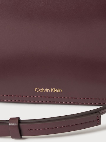 raudona Calvin Klein Rankinė su ilgu dirželiu