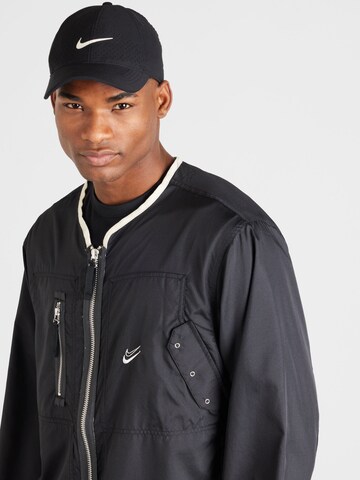 NIKE Sportjacke in Schwarz