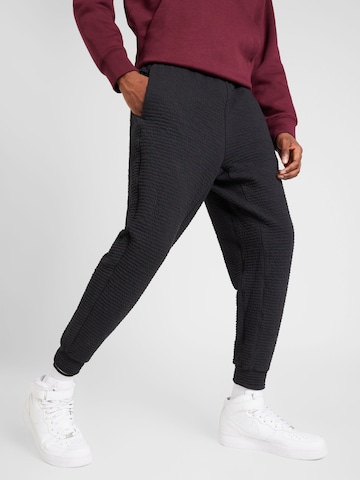 NIKE Дънки Tapered Leg Спортен панталон в черно: отпред