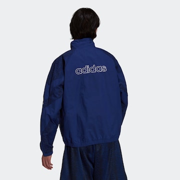 ADIDAS ORIGINALS - Chaqueta de entretiempo en azul