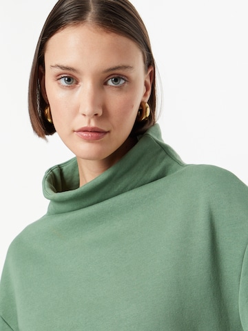 Urban Classics Sweatshirt i grön