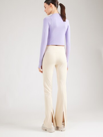 EA7 Emporio Armani Zvonový Sportovní kalhoty – šedá