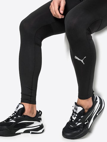 PUMA Skinny Sportbroek in Zwart