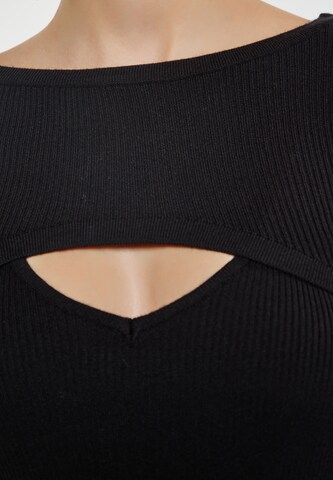 nascita Top in Schwarz