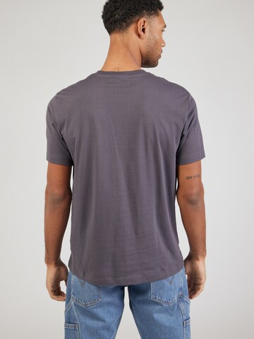 Maglietta di Champion Authentic Athletic Apparel in lilla