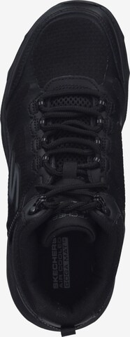 Baskets basses SKECHERS en noir