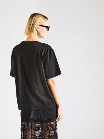 GUESS JEANS T-Shirt 'ICONIC' in Schwarz
