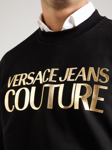 Versace Jeans CoutureSweater majica - crna boja