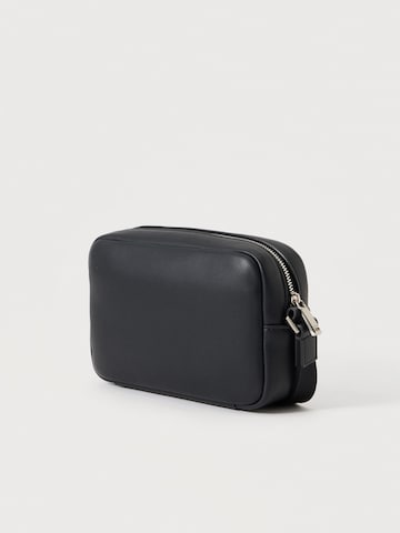 Calvin Klein Piperetáskák 'RAISED' - fekete