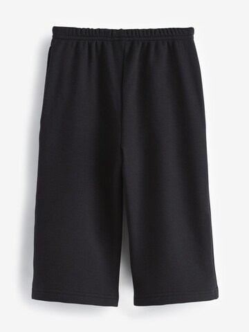 Wide leg Pantaloni di Next in nero
