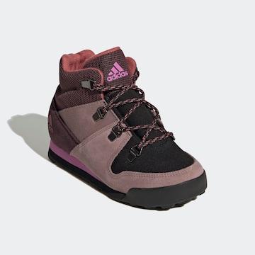 Boots 'Climawarm Snowpitch' di ADIDAS TERREX in rosso