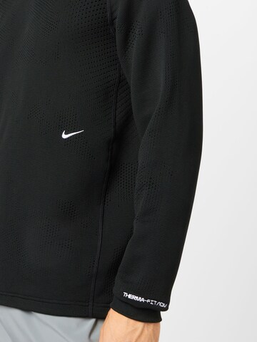 NIKE Bluzka sportowa w kolorze czarny