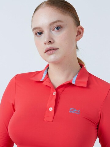 SPORTKIND Funktionsshirt 'Poloshirt Langarm'‌‌‌‌‌‌ in Orange