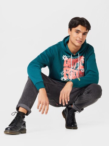 PUMA - Sweatshirt de desporto 'Run it Back' em verde