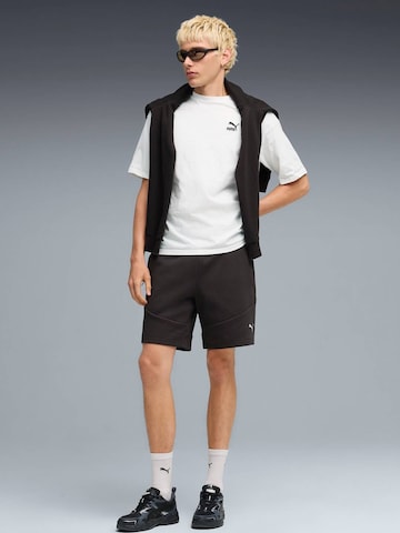regular Pantaloni sportivi 'Puma Evostripe Shorts Dk' di PUMA in nero: frontale