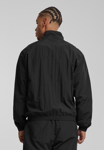 Giacca di mezza stagione 'Essential' di Karl Kani in nero