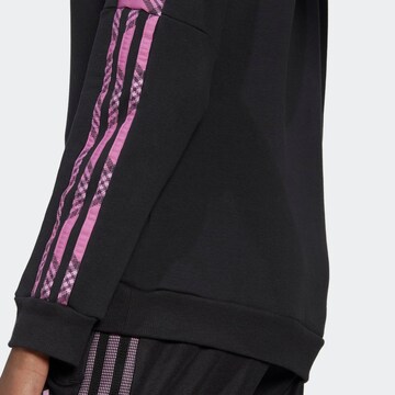 ADIDAS SPORTSWEAR Sportsweatshirt 'Tiro Winterized' in Schwarz