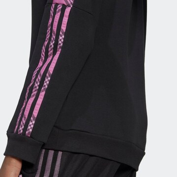 ADIDAS SPORTSWEAR Sportsweatshirt 'Tiro Winterized' i svart