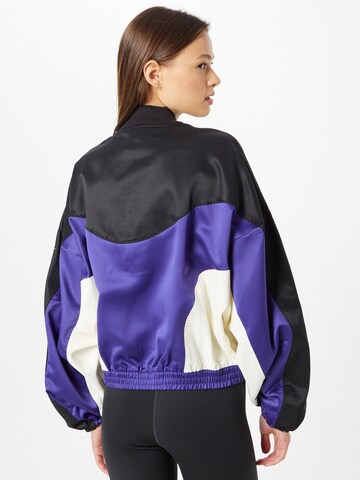 Reebok Athletic Jacket in Purple