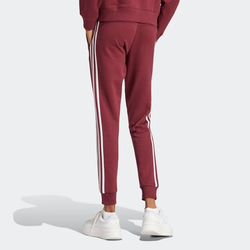 ADIDAS SPORTSWEAR Tapered Sportbroek 'Essential' in Rood