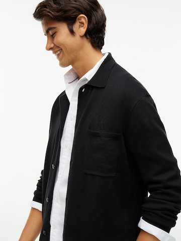 Vestes en maille TOMMY HILFIGER en noir
