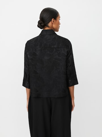 Veste mi-saison 'MaIdakaia' Masai en noir